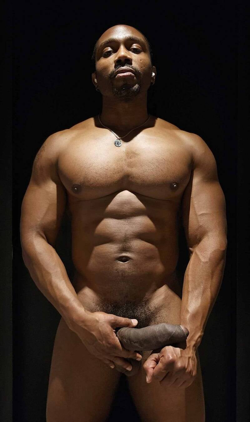 tall muscular Black man exuding pride and confidence as he explore his erotic self