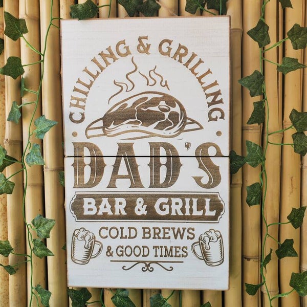 Dad's Bar & Grill rustic wooden sign