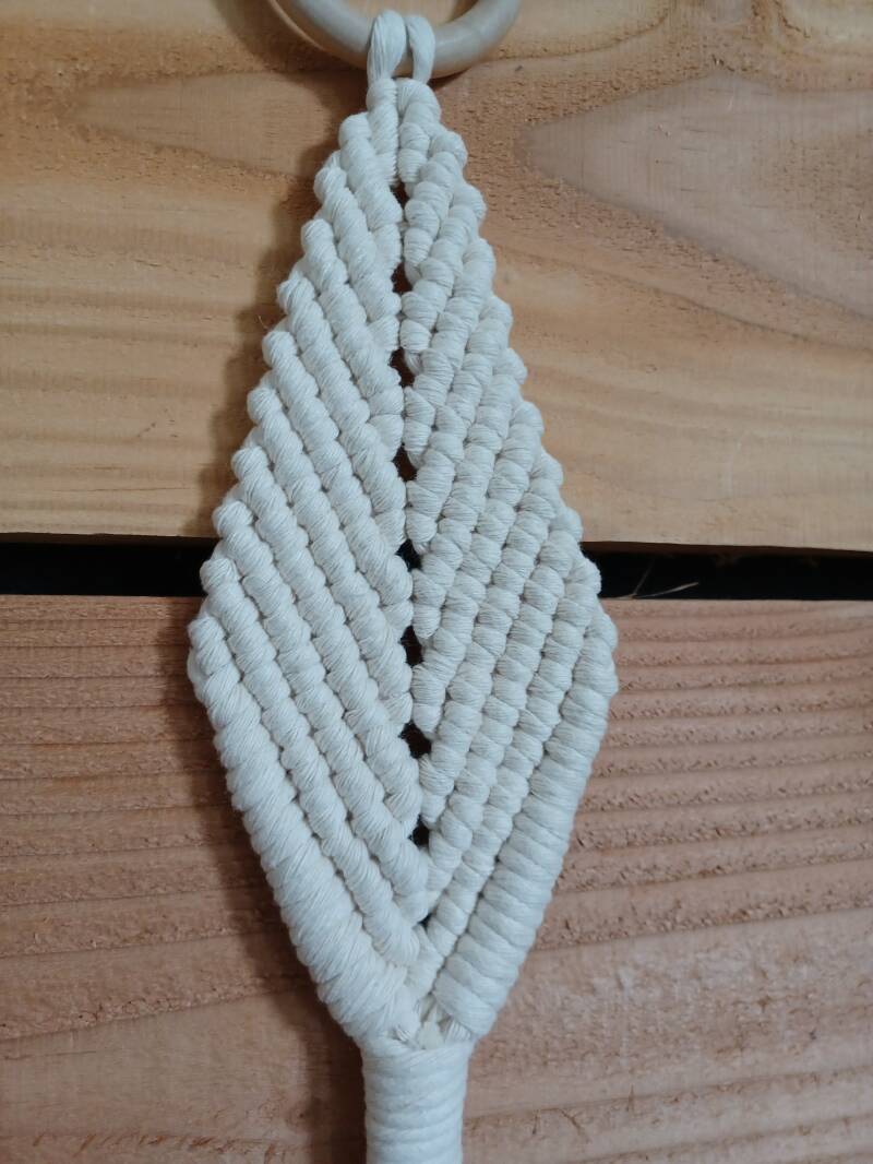 Model Eise € 10,- pijlvorm met houten ring