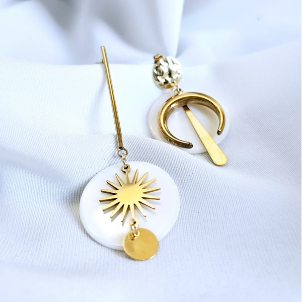 White SeaShell and Moon-Sun Asymmetrical