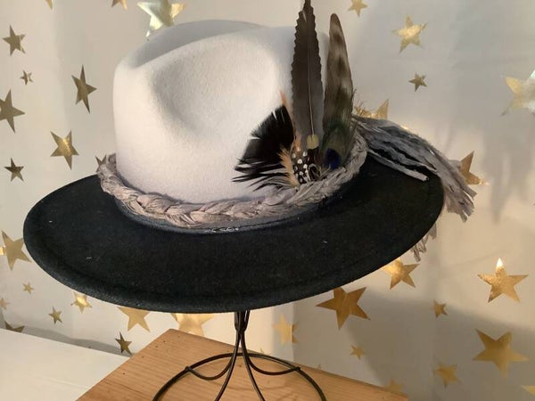 Black and cream fedora with feathers