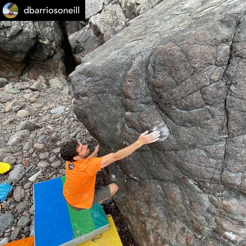 uk bouldering, bouldering in cornwall, bouldering south west, bouldering, uk, cornish coast, roots climbing team member working a new boulder problem, huge gains from baseline hangboard training, 