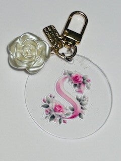 Sleutelhanger rond met ABC  bloem