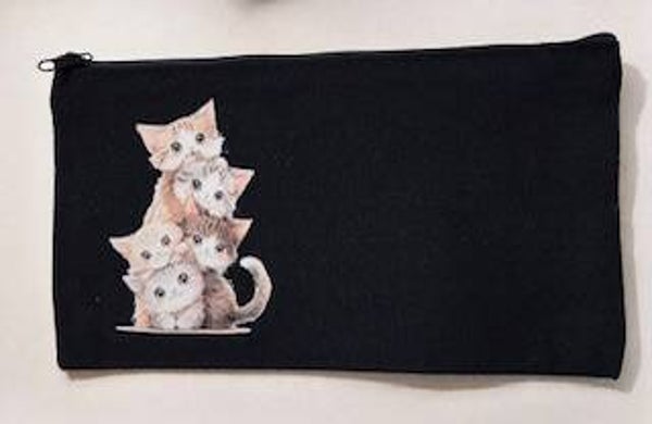 Toilettas of pennenzak katjes