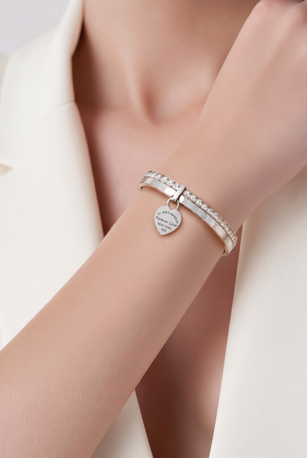 Jonc acier inoxydable argent chiffres romains et breloque coeur gravé