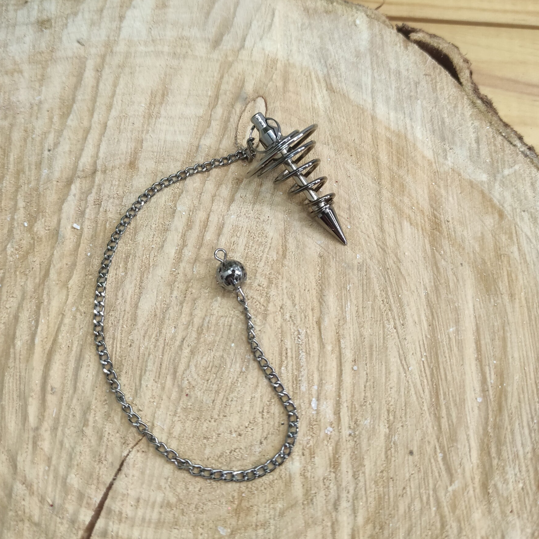 Pendule spirale métal noir