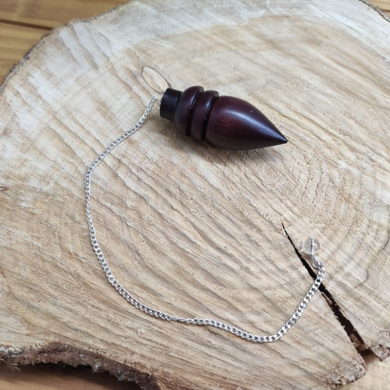 Pendule goutte en bois de rose