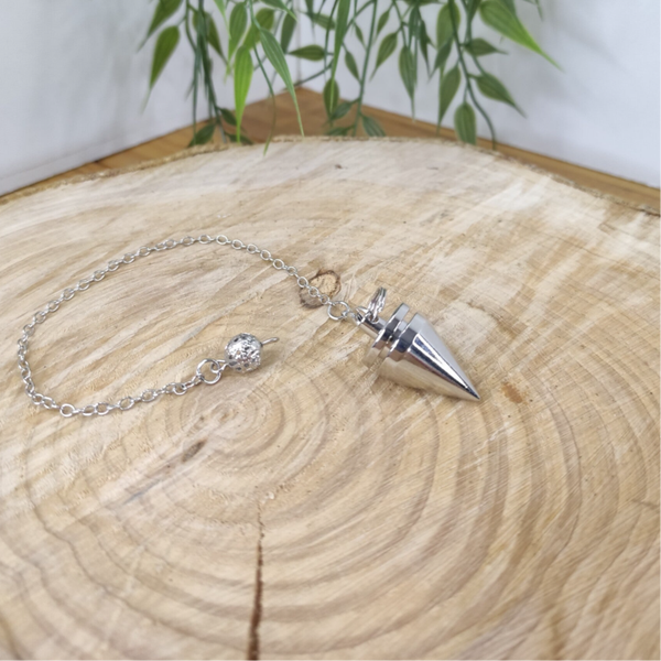 Pendule métal argenté cône