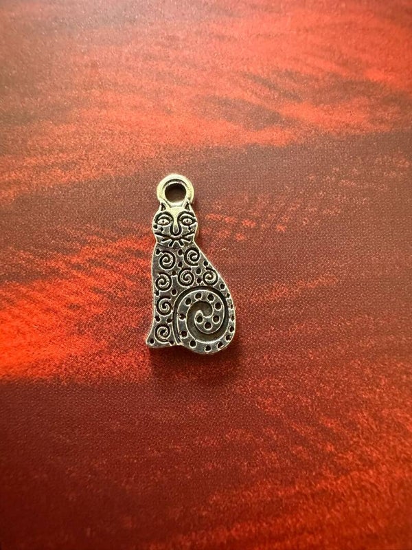 Silver cat charm