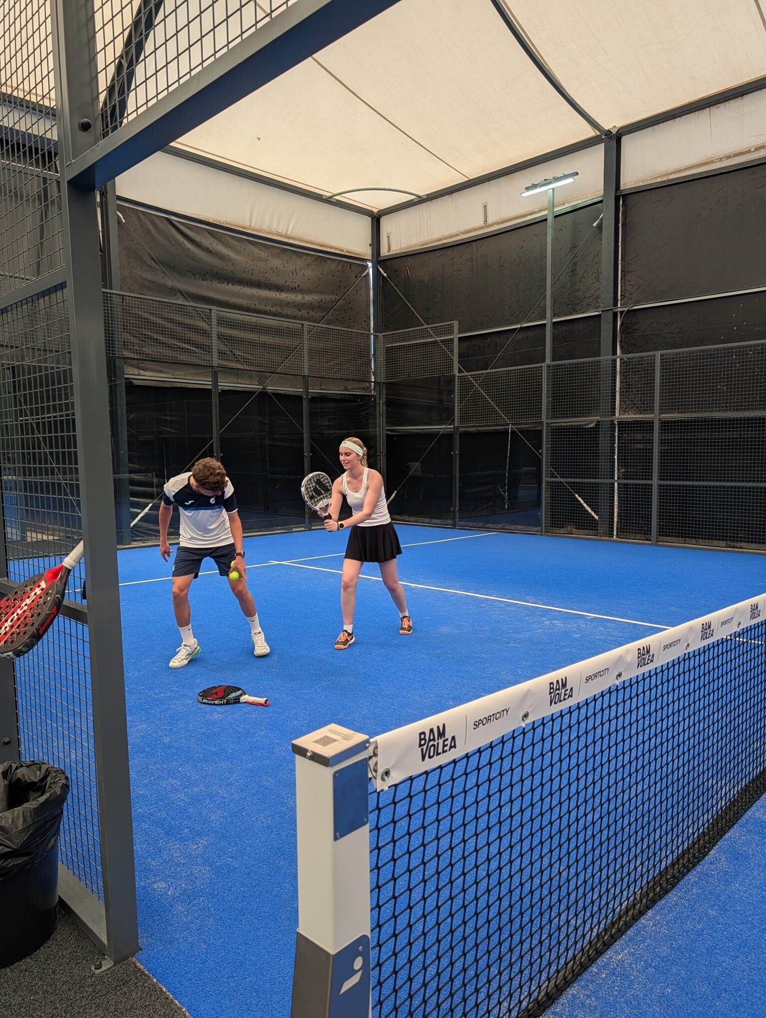 Trainer mit Spielerin