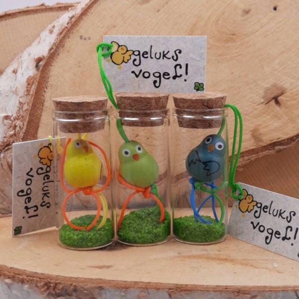 Wensflesje 'geluksvogel'