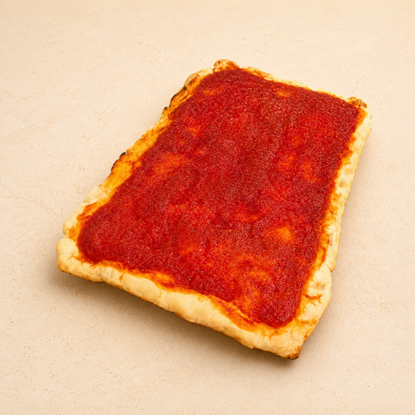 Base de pizza amb tomata