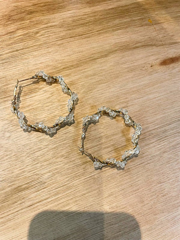 Goud kleurige creolen