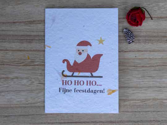Kerstkaart op bloeipapier - Kersman met slee in rode kleuren