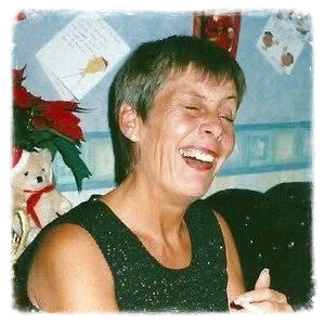 Lyn Mounteney smiling and laughing.