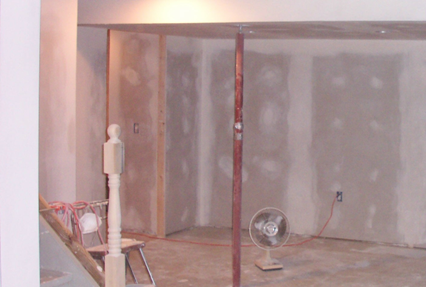 Basement drywall installed, taped and mudded