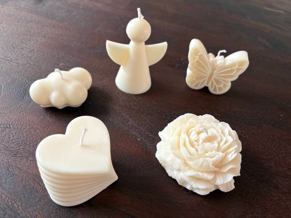 Kleine kaarsen in lieve vormen
