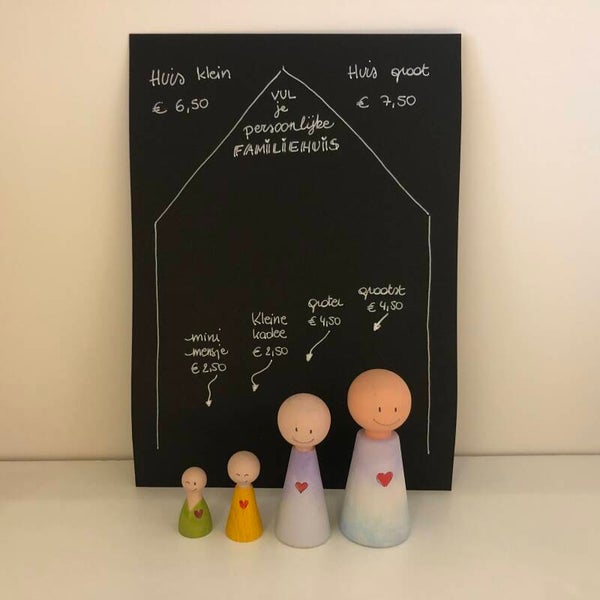 Houten poppetje - groter of grootst