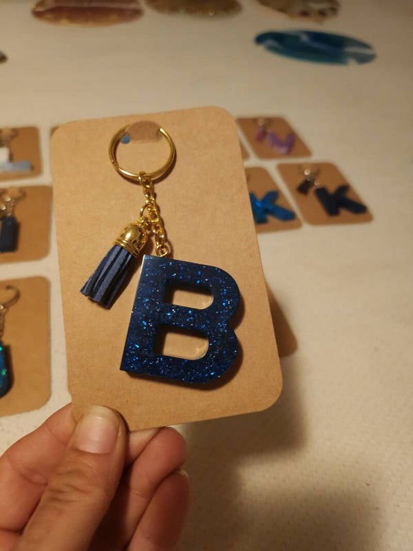 Schlüsselanhänger mit  Puschel