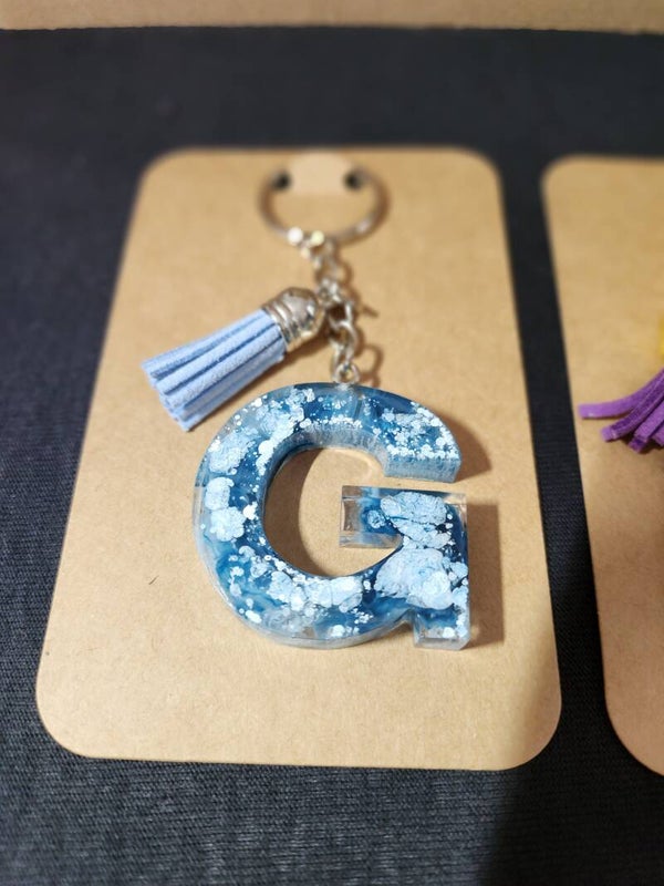 Schlüsselanhänger mit  Puschel