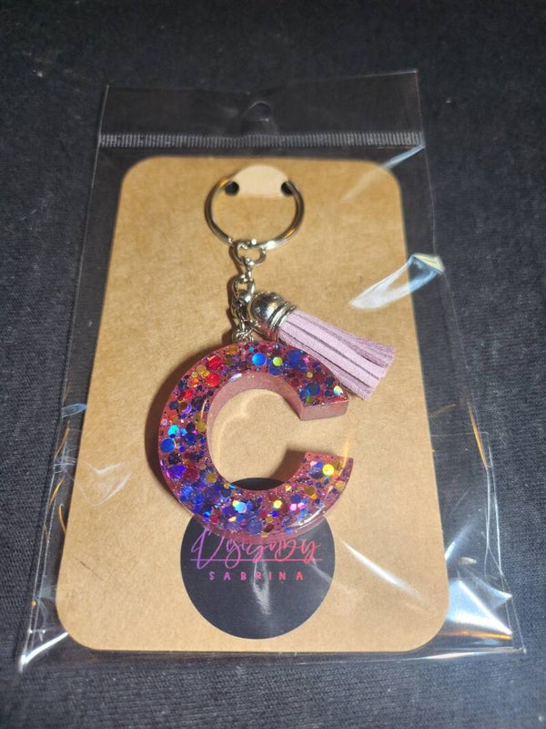 Schlüsselanhänger mit  Puschel