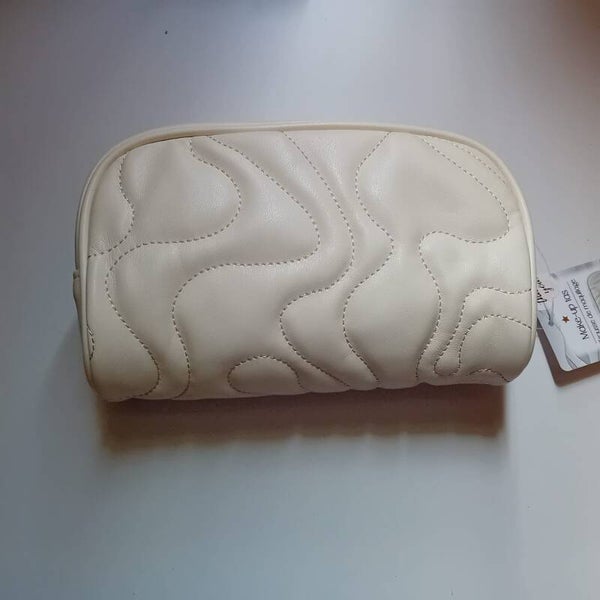 Nieuw toilettas creme