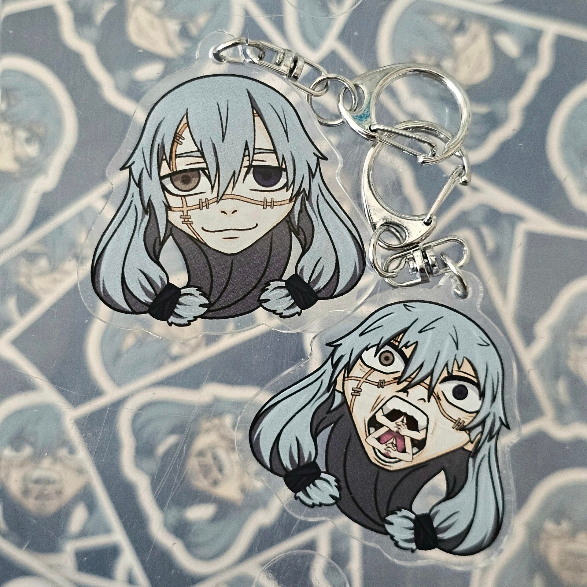 Mahito double-sided keychain