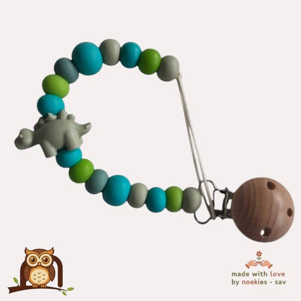 nr 27 noekies Speenkoord dino turquoise khaki