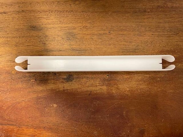Tæppeskytte, model Sandwich i plastic, 33 cm. Hvid