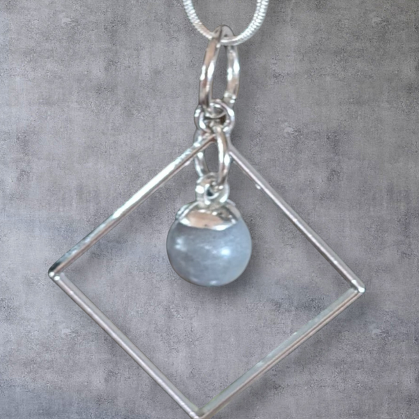 Betonschmuck Perle silberner Rahmen "Unikat"