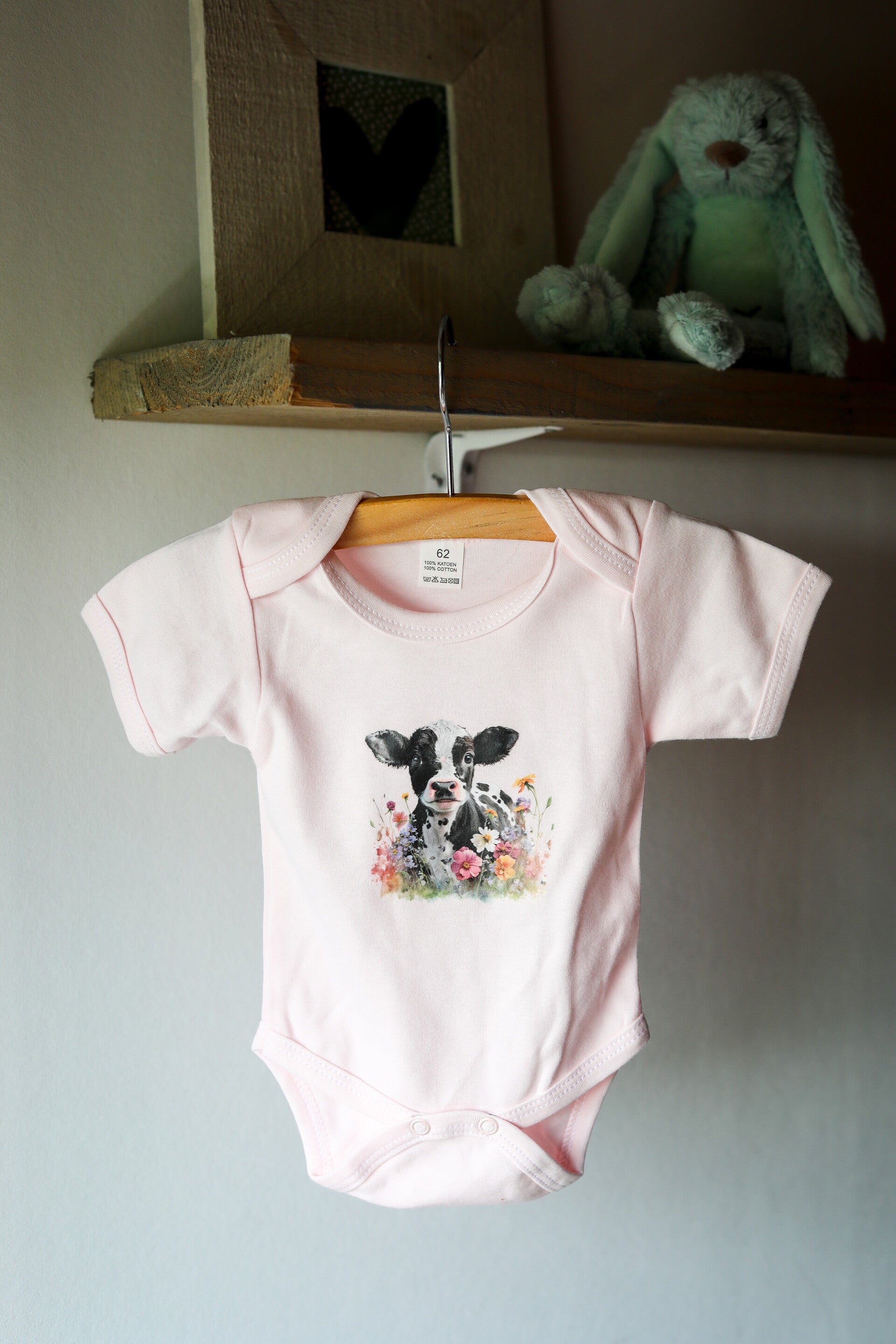 Baby romper kalfje met bloemen