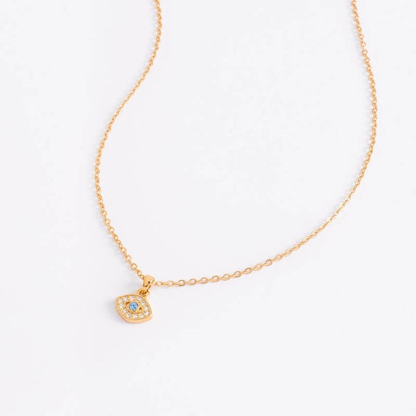 Necklace with 18k gold plated charm and crystal and blue stones