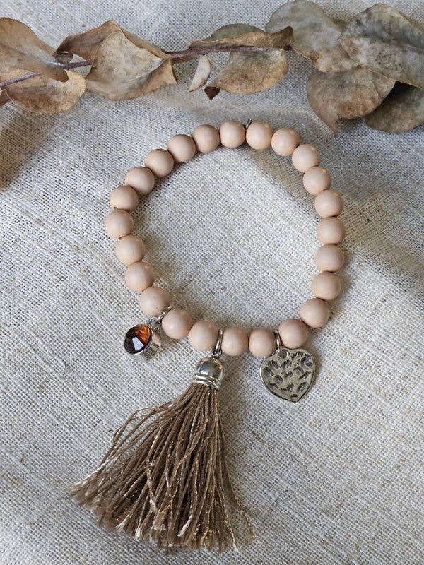 Biba Elastische armband beige kwast