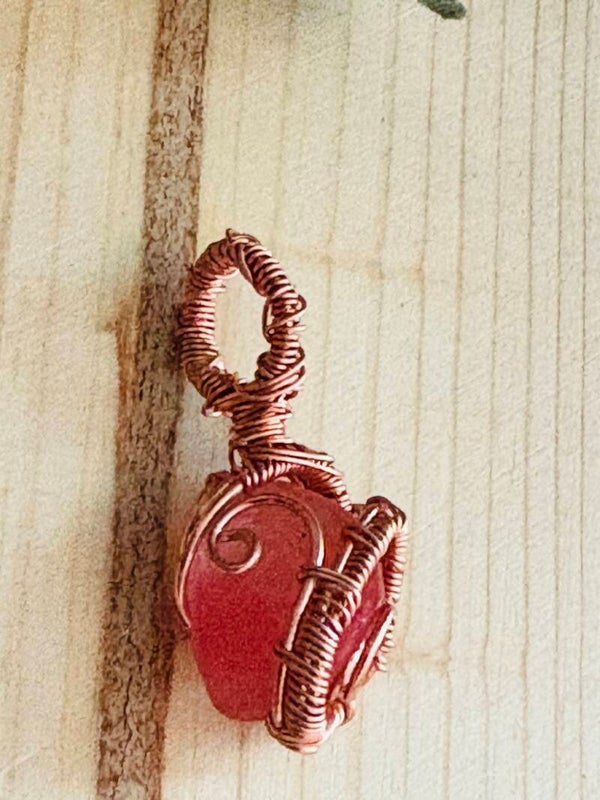 Coooer wire wrapped strawberry quartz pendant