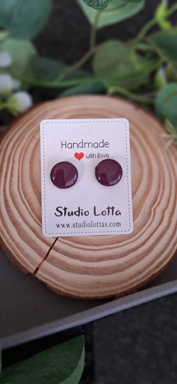 Handgemaakte oor steker paars rond