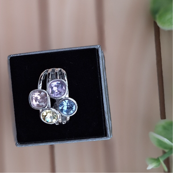 Ring met uniek reksysteem: voor iedereen gepast: zilverkleurig met stenen in meerdere kleuren