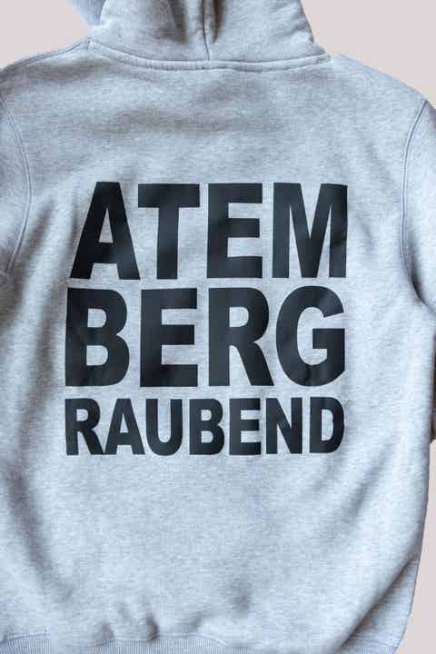 Hoodie „atembergraubend“ – grau, unisex