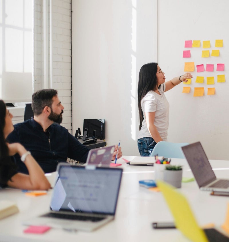 Photo by <a href="https://unsplash.com/@jasongoodman_youxventures?utm_content=creditCopyText&utm_medium=referral&utm_source=unsplash">Jason Goodman</a> on <a href="https://unsplash.com/photos/woman-placing-sticky-notes-on-wall-Oalh2MojUuk?utm_content=cred