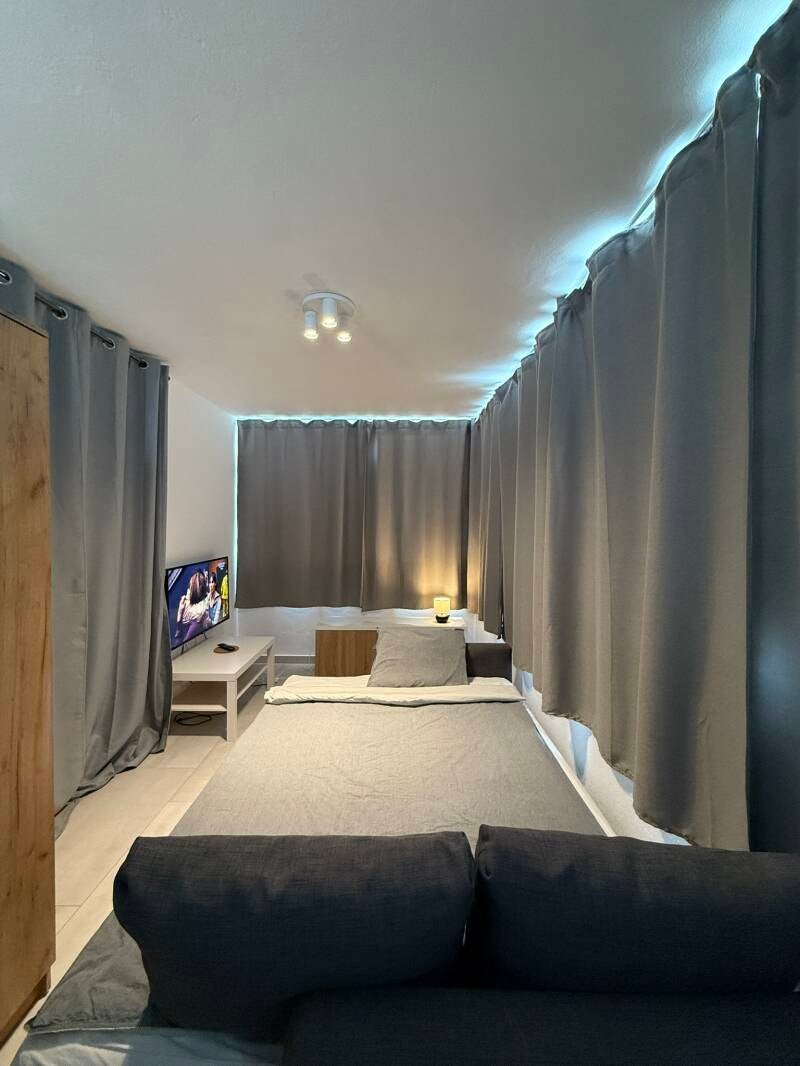 Sofa bed prepared for sleeping in the relaxation room at Casa Havn