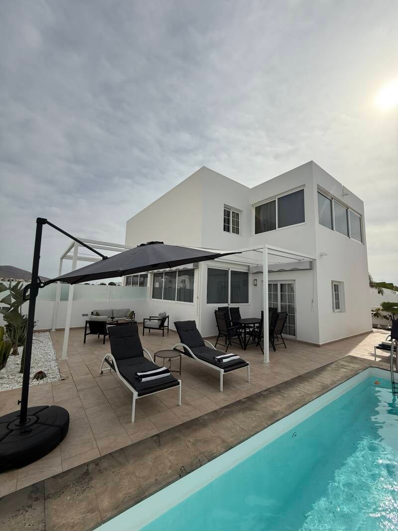 Casa Havn heated outdoor pool surrounded by a private terrace