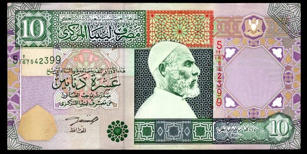 Libya, 10 Dinars (2002). series 5/167. F-VF. dy13333