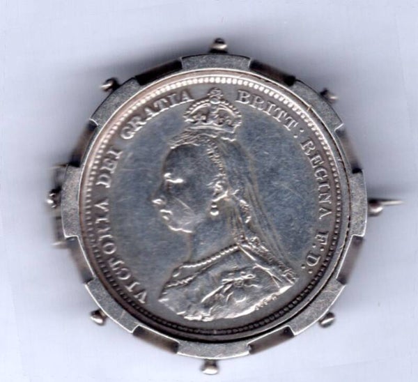 Victoria. Shilling 1887 in form of badge.