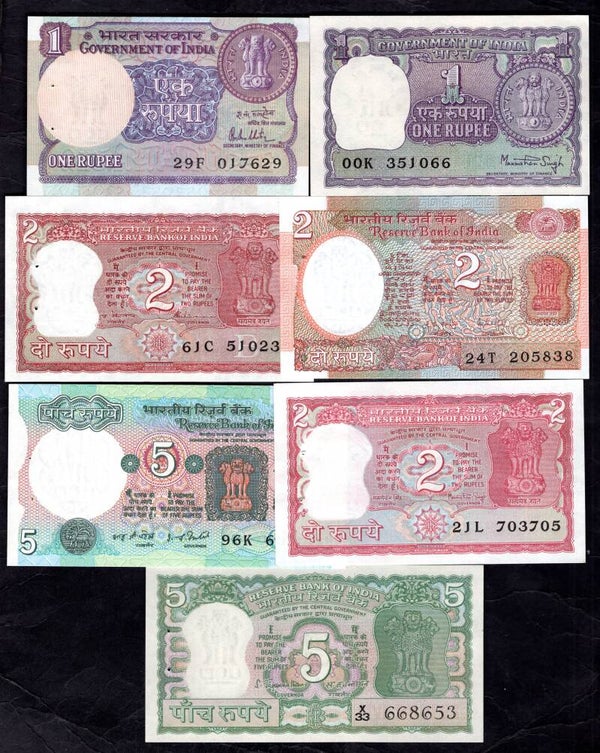 India. 14 banknotes, with booklet holes, average AU. DY17693