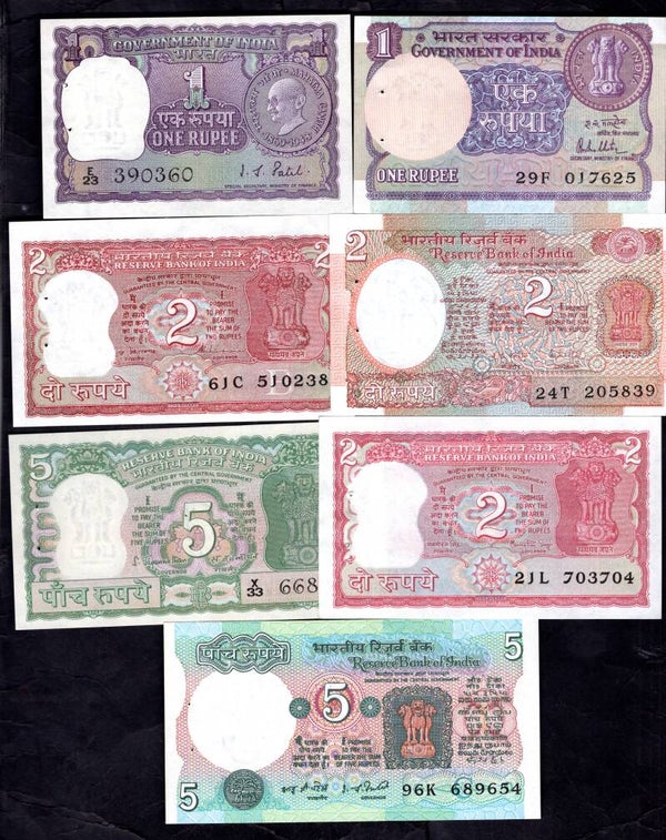 India. 14 banknotes, with booklet holes, average AU. DY17694