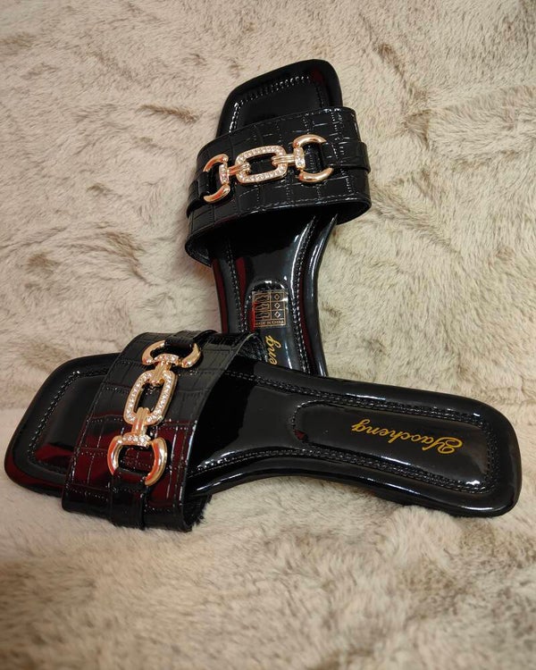 Slippertjes met gouden detail Zwart croc lak