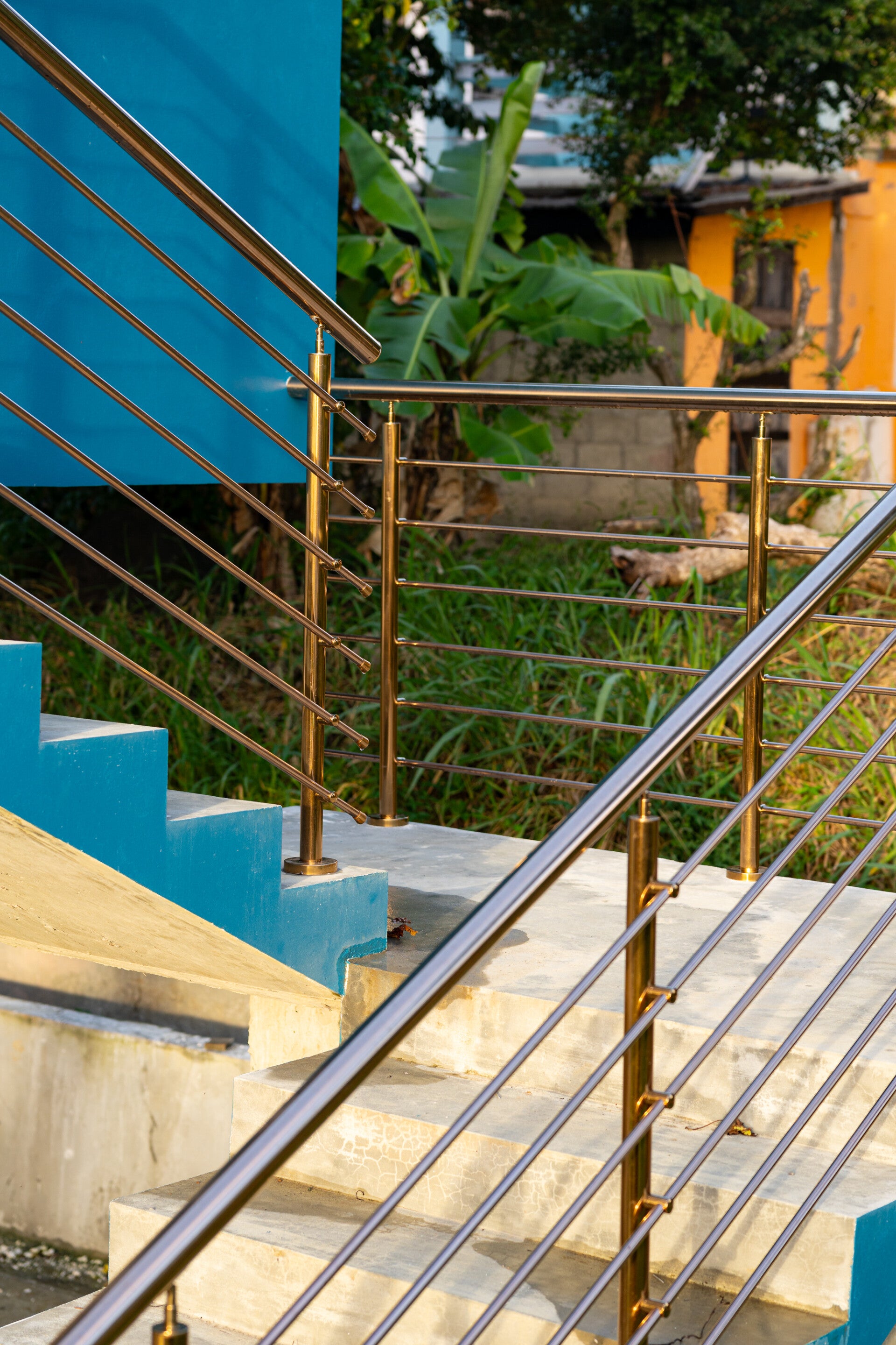 copper or rosegold toned stainless steel railings sourced and installed at Ciceron St lucia by Progressive Welding Solutions  Ltd