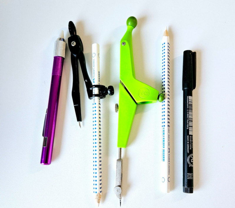 Zirkel und Kreidestifte