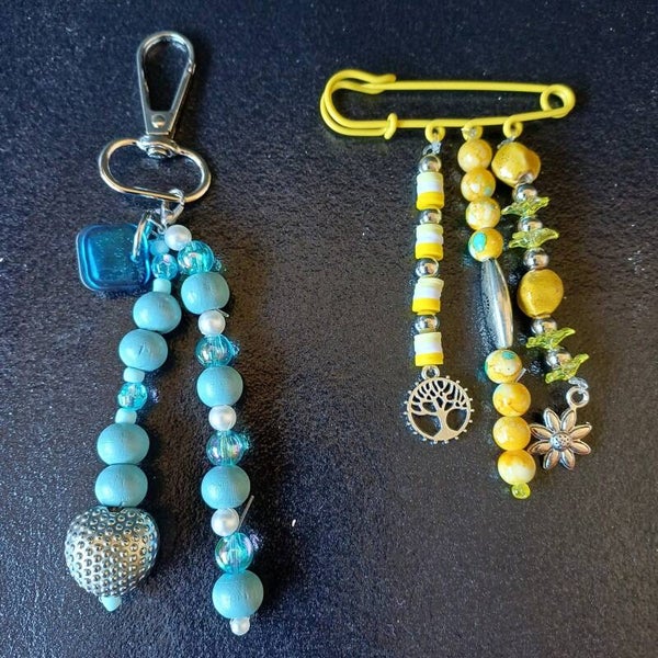 broche speld en een tassenhanger