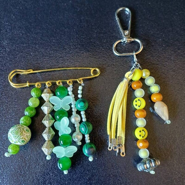 broche speld en een tassenhanger