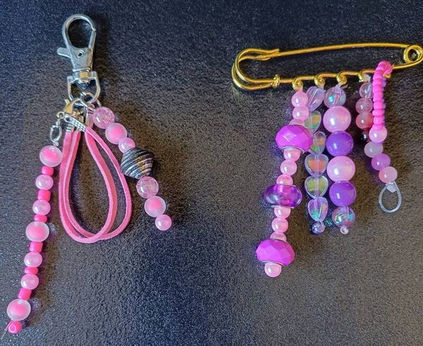 broche speld en een tassenhanger